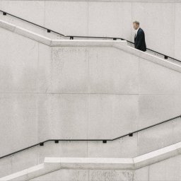 Introvert walking up distant steps